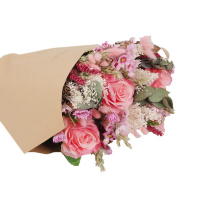 Pink flower bouquet wrapped in brown kraft paper, with pink and white blooms and green leaves